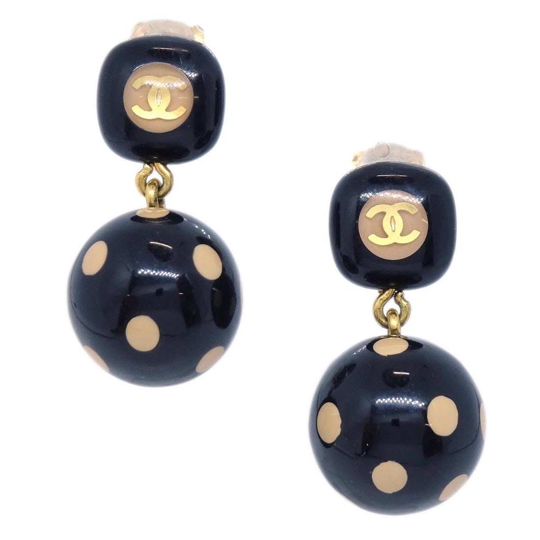 CHANEL 00A Clip On Dangle Earrings Gold Plated Black Acrylic: CHANEL 00A Clip On Dangle Earrings Gold Plated Black Acrylic Clip-on Chanel dangle earrings in black and gold with acrylic and gold-plated construction. Marked 00A and made in France, this pair presen