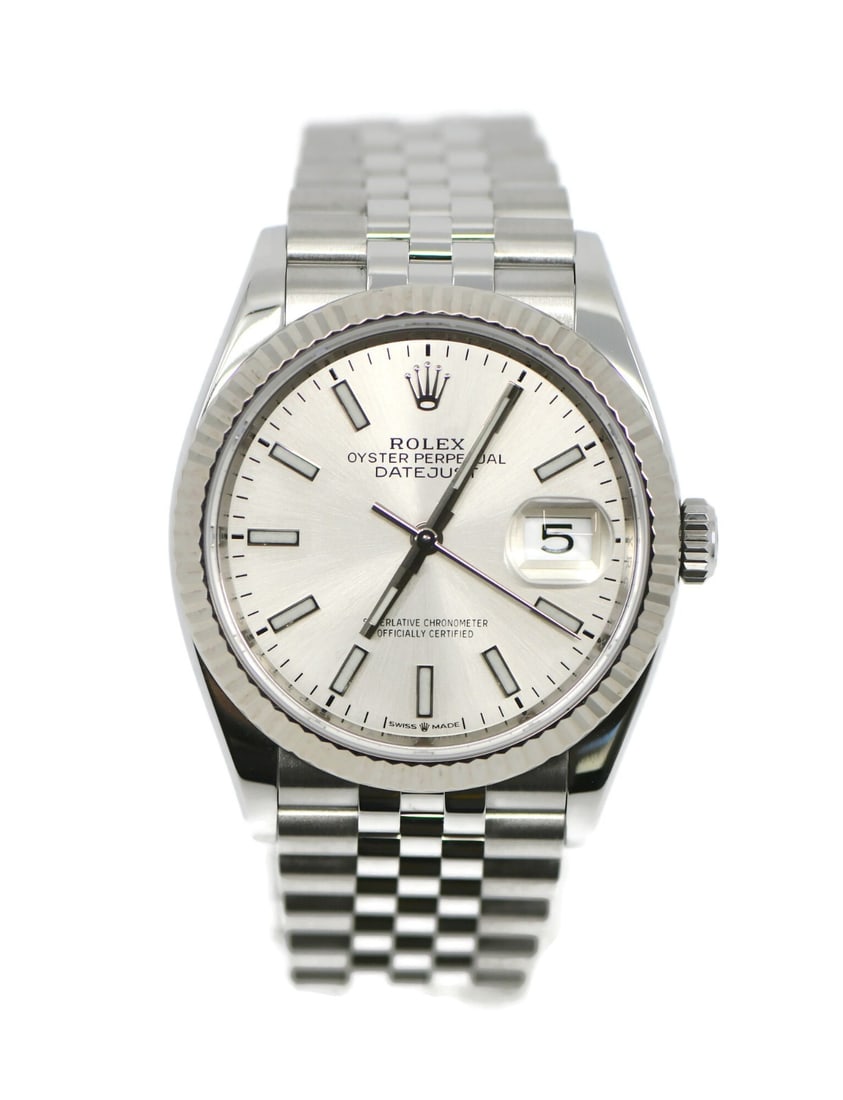 Rolex Datejust 126234 Automatic Stainless Steel Wristwatch: Rolex Datejust 126234 Automatic Stainless Steel Wristwatch This Rolex Datejust is a luxury wristwatch crafted from stainless steel, featuring a polished 36mm round case with a fluted silver bezel. The