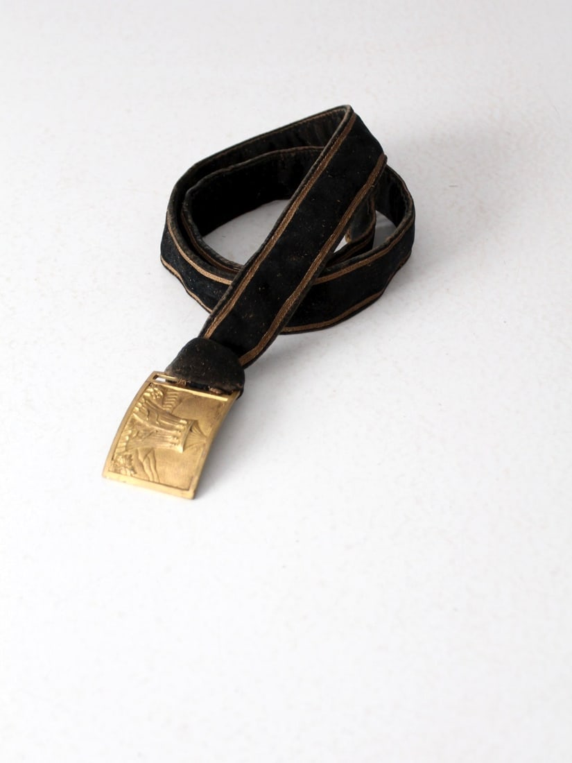 Antique IOOF Odd Fellows Velvet Belt with Brass Tent Buckle: Antique IOOF Odd Fellows Velvet Belt with Brass Tent Buckle This antique IOOF Odd Fellows regalia belt is a striking accessory made from black velvet, adorned with elegant gold trim. It features a bra