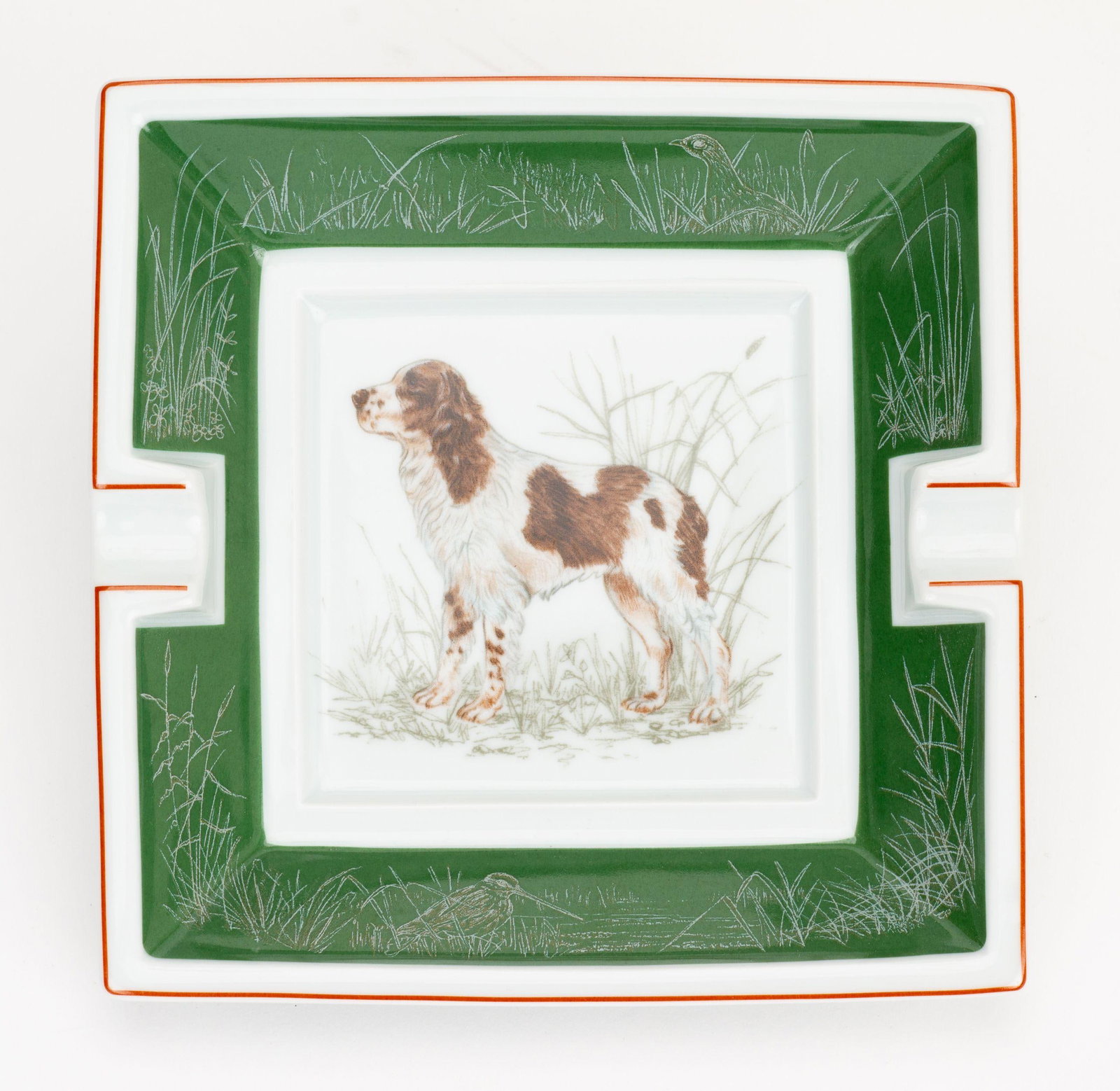 Hermes Porcelain Sprinter Dog Ashtray Green White 6.3 in France: Hermes Porcelain Sprinter Dog Ashtray Green White 6.3 in France This exquisite Hermes Sprinter Dog Ashtray showcases a charming design rendered in vibrant green porcelain. Crafted in France, this piec