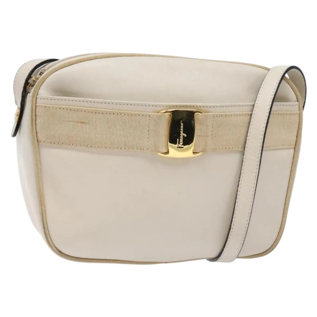 Beige Leather Shoulder Bag Salvatore Ferragamo Vala: Beige Leather Shoulder Bag Salvatore Ferragamo Vala This Salvatore Ferragamo Vala Shoulder Bag is crafted from beige leather and features a classic design for women. The bag shows signs of use, includ
