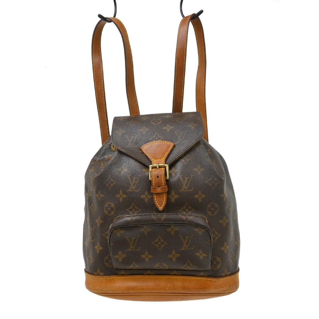 Louis Vuitton Montsouris MM Monogram Canvas Backpack M51136: Louis Vuitton Montsouris MM Monogram Canvas Backpack M51136 Vintage Louis Vuitton Montsouris MM backpack in brown Monogram canvas with leather trim. This women's medium backpack features a flap buckle