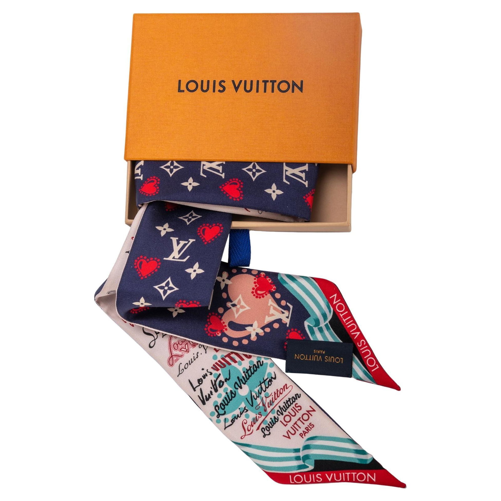 Louis Vuitton Blue Hearts Silk Twilly 100% Silk BNIB: Louis Vuitton Blue Hearts Silk Twilly 100% Silk BNIB Elevate your style with this exquisite Louis Vuitton Blue Hearts Silk Twilly. Crafted from 100% silk, this luxurious accessory features a charming 