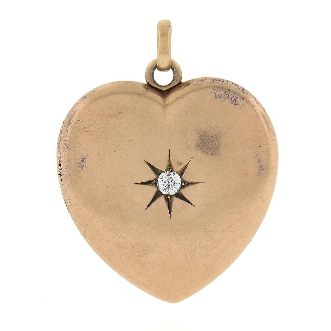 Antique Victorian 10k Gold Heart Locket Pendant with Diamond: Antique Victorian 10k Gold Heart Locket Pendant with Diamond This exquisite Antique Victorian heart locket pendant is crafted from solid 10k rosy yellow gold and features intricate engravings. Designe