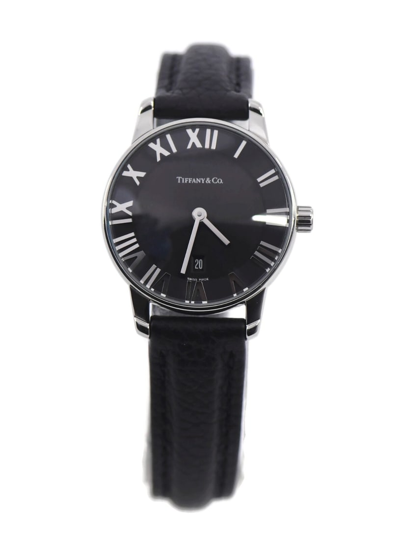 Tiffany & Co Atlas Quartz Stainless Steel Watch with Leather Band: Tiffany & Co Atlas Quartz Stainless Steel Watch with Leather Band This elegant Tiffany & Co. Atlas wristwatch features a sleek black dial and is powered by a reliable quartz movement. The case is craf