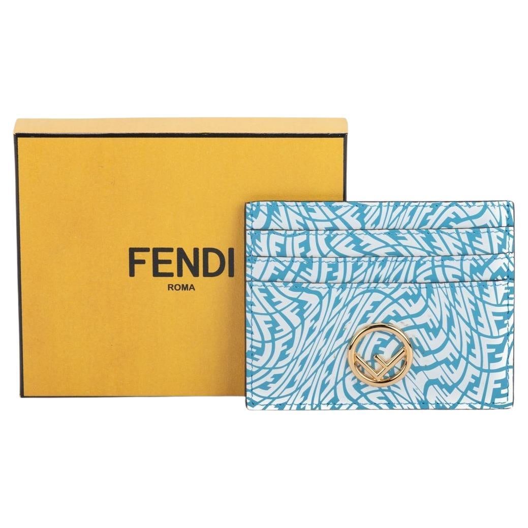 Fendi x Sarah Coleman Leather Card Holder with Bullseye Print: Fendi x Sarah Coleman Leather Card Holder with Bullseye Print This Fendi x Sarah Coleman card holder is an exquisite accessory that combines style and functionality. Crafted from high-quality leather,