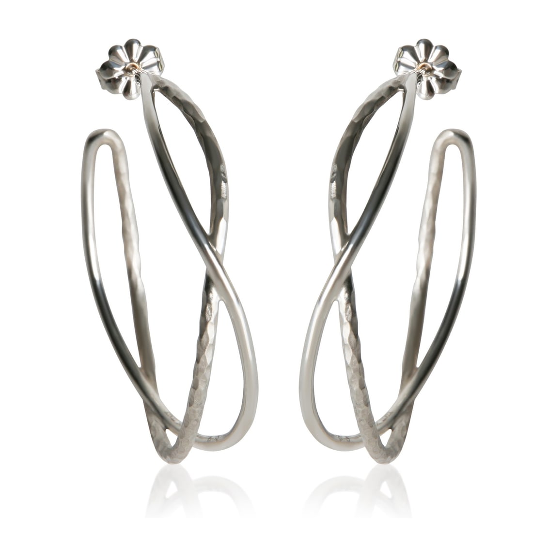 Tiffany Co Paloma Picasso Sterling Silver Hoop Earrings: Tiffany Co Paloma Picasso Sterling Silver Hoop Earrings These pre-owned Tiffany & Co. Paloma Picasso Crossover Hoop Earrings are crafted from 925 sterling silver and feature a distinctive crossover de