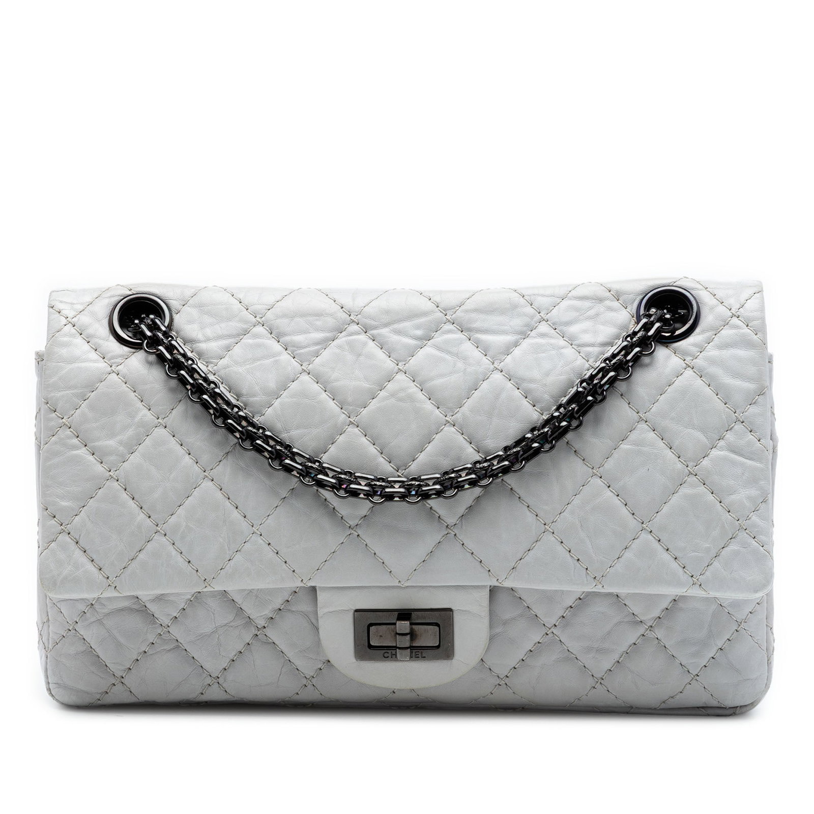 Chanel Reissue 2.55 White Quilted Calfskin Shoulder Bag: Chanel Reissue 2.55 White Quilted Calfskin Shoulder Bag This Chanel Quilted Aged Calfskin Reissue 2.55 Double Flap 225 shoulder bag is crafted from white aged calfskin leather with a signature quilted