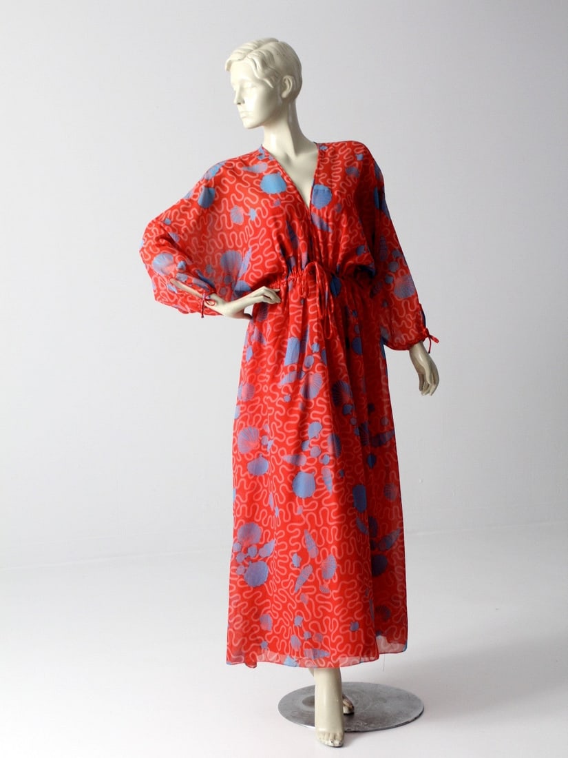 Rare 1970s Zandra Rhodes Red Maxi Dress with Seashell Print: Rare 1970s Zandra Rhodes Red Maxi Dress with Seashell Print Elevate your wardrobe with this stunning vintage dress from the early 1970s Zandra Rhodes collection. Crafted from airy faux chiffon, this e
