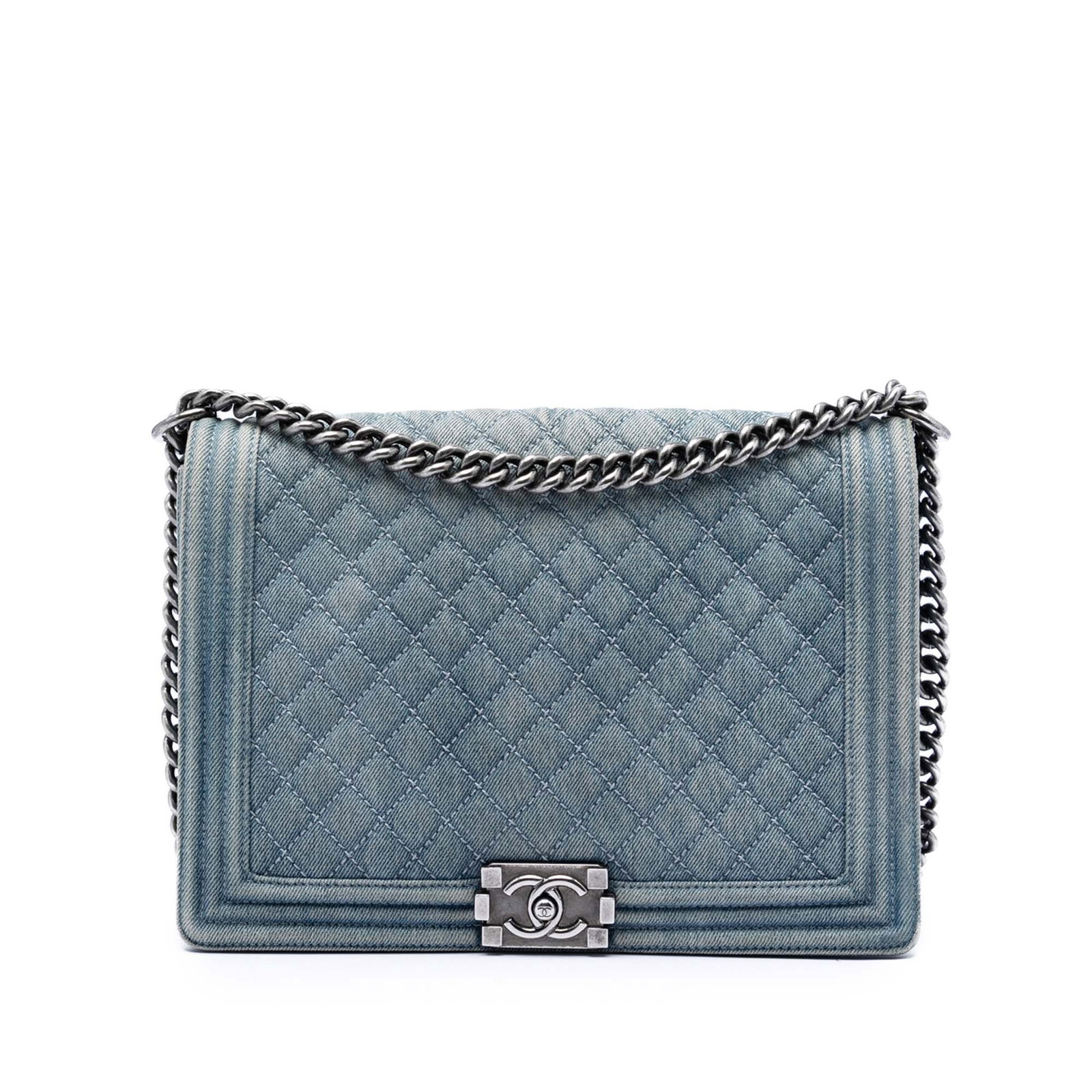 Chanel Boy Flap Quilted Denim Blue Bag: Chanel Boy Flap Quilted Denim Blue Bag This Chanel Large Quilted Denim Boy Flap bag features a blue quilted denim exterior, a curb chain strap with an adjustable flat leather guard, and a front flap s