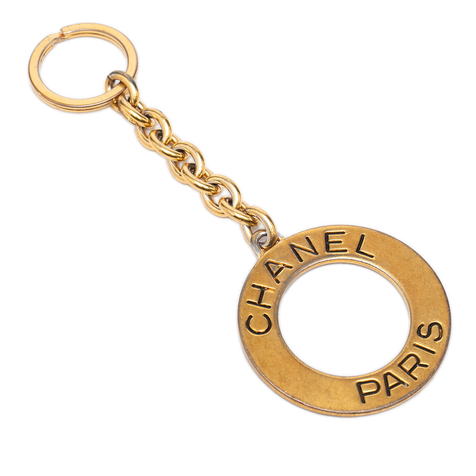 Chanel Gold Plated Logo Key Chain Ring: Chanel Gold Plated Logo Key Chain Ring Gold-tone metal Chanel logo key ring from France. The piece is made of metal and measures 16.50 cm in length and 6.00 cm in width. Condition is B+, with noted ru