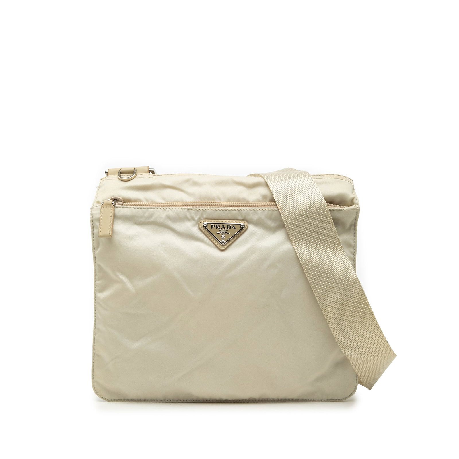 Prada Tessuto Nylon Crossbody Bag with Front Zip Pocket: Prada Tessuto Nylon Crossbody Bag with Front Zip Pocket This Prada Tessuto Zip Top Crossbody is a beige crossbody bag made in Italy. It features a nylon body, an adjustable flat shoulder strap, a top 