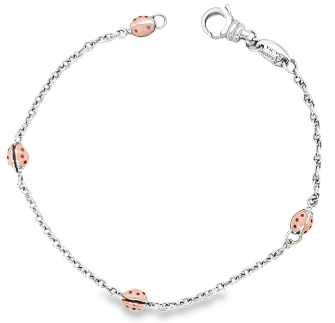Aaron Basha Ladybug Charm Bracelet in 18k White Gold Pink Enamel: Aaron Basha Ladybug Charm Bracelet in 18k White Gold Pink Enamel This pre-owned Aaron Basha charm bracelet is crafted in 18k white gold and features a pink enamel ladybug charm. It is signed and marke