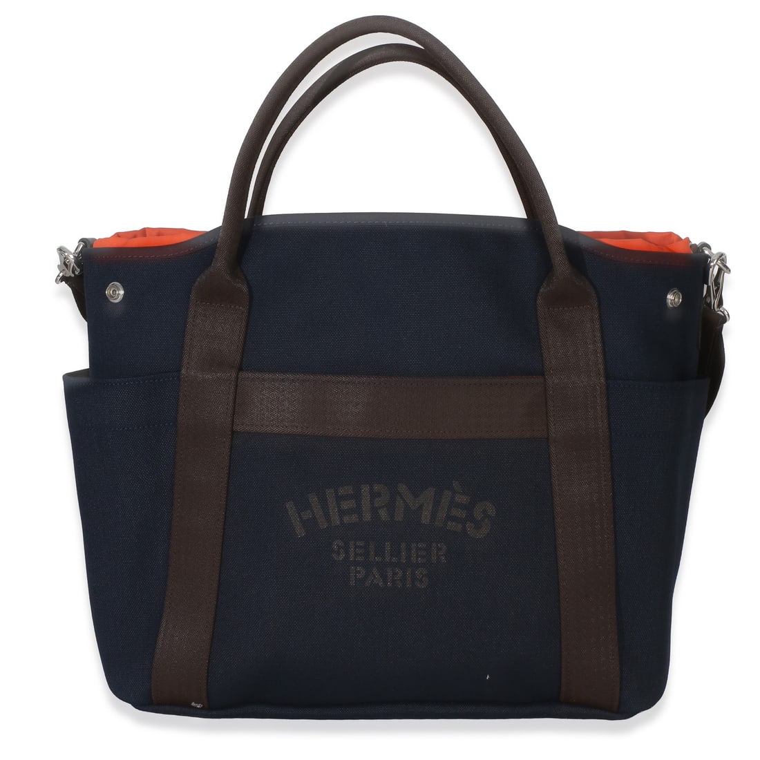 Hermes The Grooming Bag blue canvas tote with dustbag: Hermes The Grooming Bag blue canvas tote with dustbag A pre-owned unisex tote bag in blue canvas, identified as The Grooming Bag. It features an open top, silver-tone hardware, a fabric and canvas lin