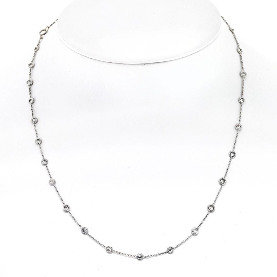 Stunning 2.50cttw Round Cut Platinum Diamonds by the Yard Necklace: Stunning 2.50cttw Round Cut Platinum Diamonds by the Yard Necklace This exquisite Diamond by the Yard necklace features a stunning total carat weight of 2.50cttw, showcasing 31 round cut diamonds that