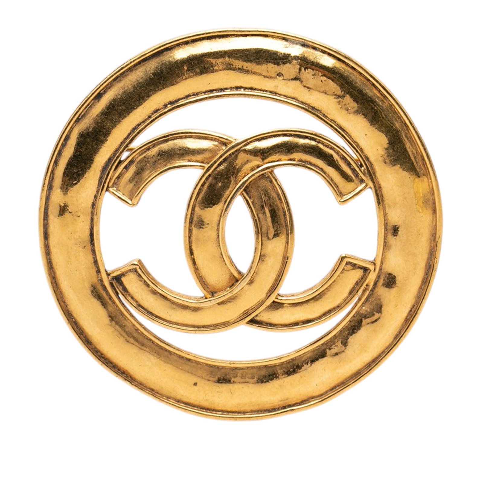 Chanel CC Round Cutout Brooch Gold Tone Metal: Chanel CC Round Cutout Brooch Gold Tone Metal Gold-tone round cut-out brooch with a back pin closure. Made in France, this costume accessory is constructed of metal and finished in gold tone. Conditio