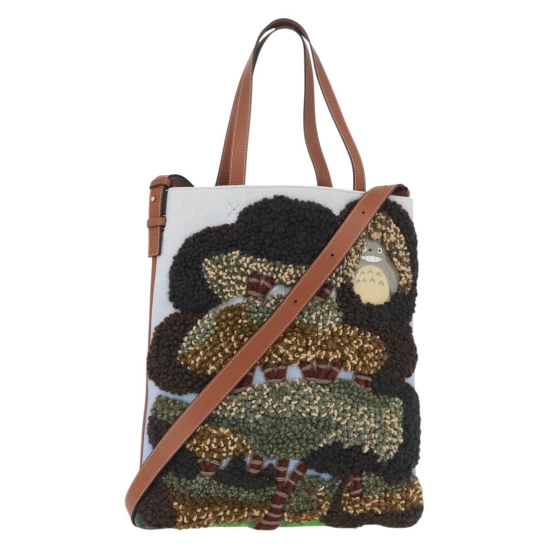 LOEWE Studio Ghibli Totoro 2way Canvas Tote Bag Brown Silver: LOEWE Studio Ghibli Totoro 2way Canvas Tote Bag Brown Silver This LOEWE tote bag features a brown and silver canvas exterior and comes with a shoulder strap and dust bag. It is a 2-way style bag made 