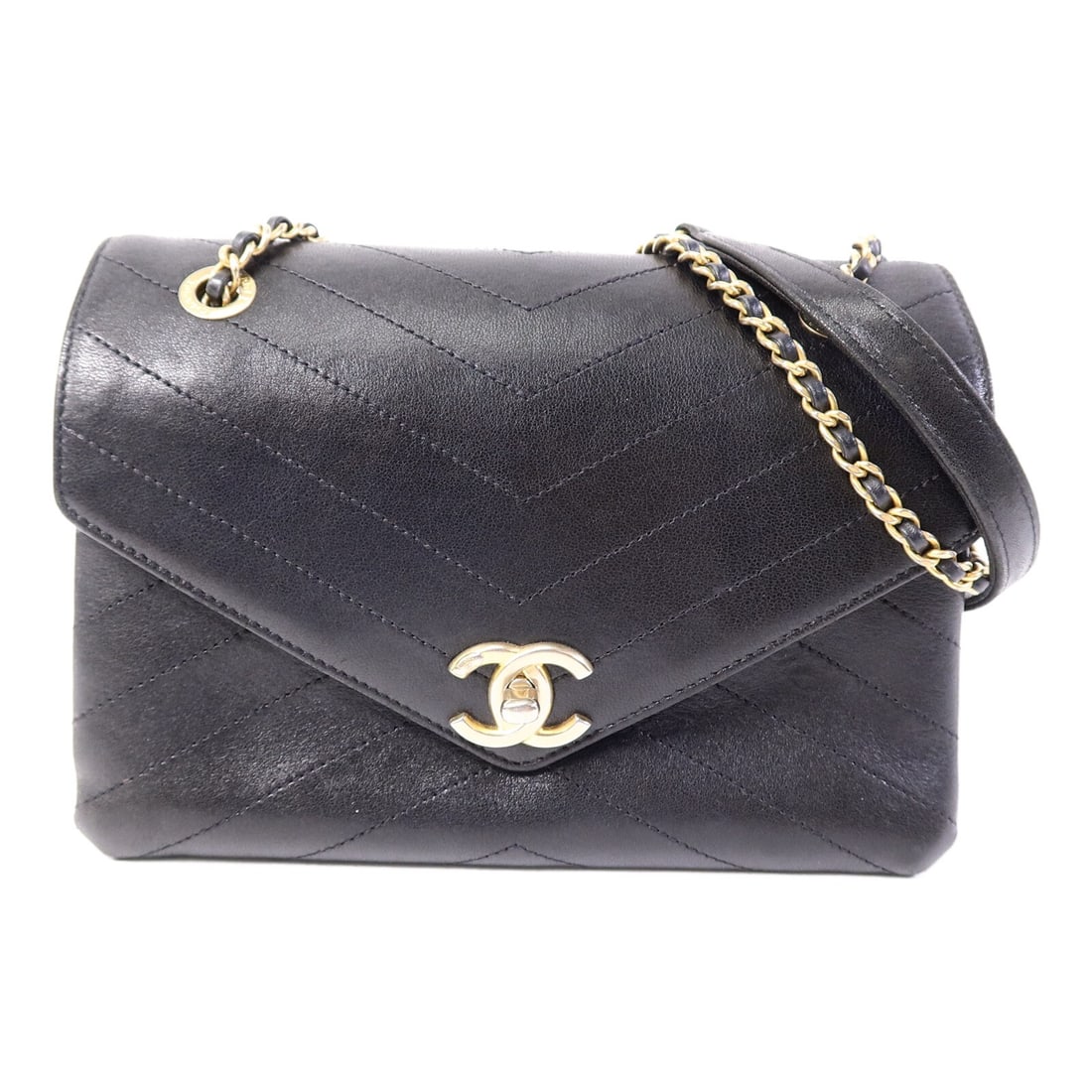 CHANEL A57432 Envelope Flap Shoulder Bag Black Calfskin CC GHW: CHANEL A57432 Envelope Flap Shoulder Bag Black Calfskin CC GHW A CHANEL envelope flap shoulder bag in black calfskin leather with gold-tone hardware. It features a chain shoulder strap, turn-lock clos