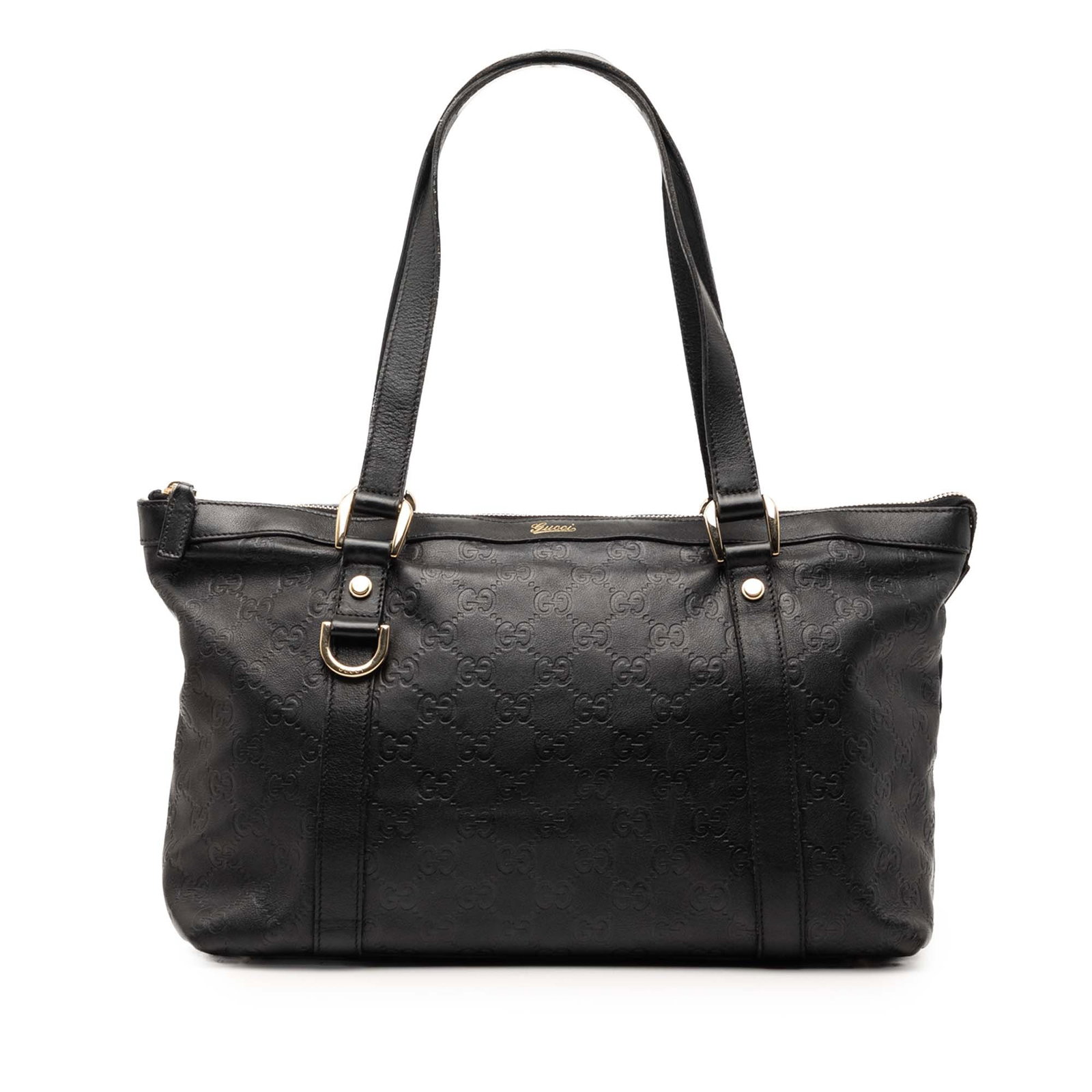 Gucci Guccissima Abbey D Ring Black Leather Tote: Gucci Guccissima Abbey D Ring Black Leather Tote This tote bag features an embossed leather body with flat leather handles and a top zip closure. The interior includes both zip and slip pockets for or