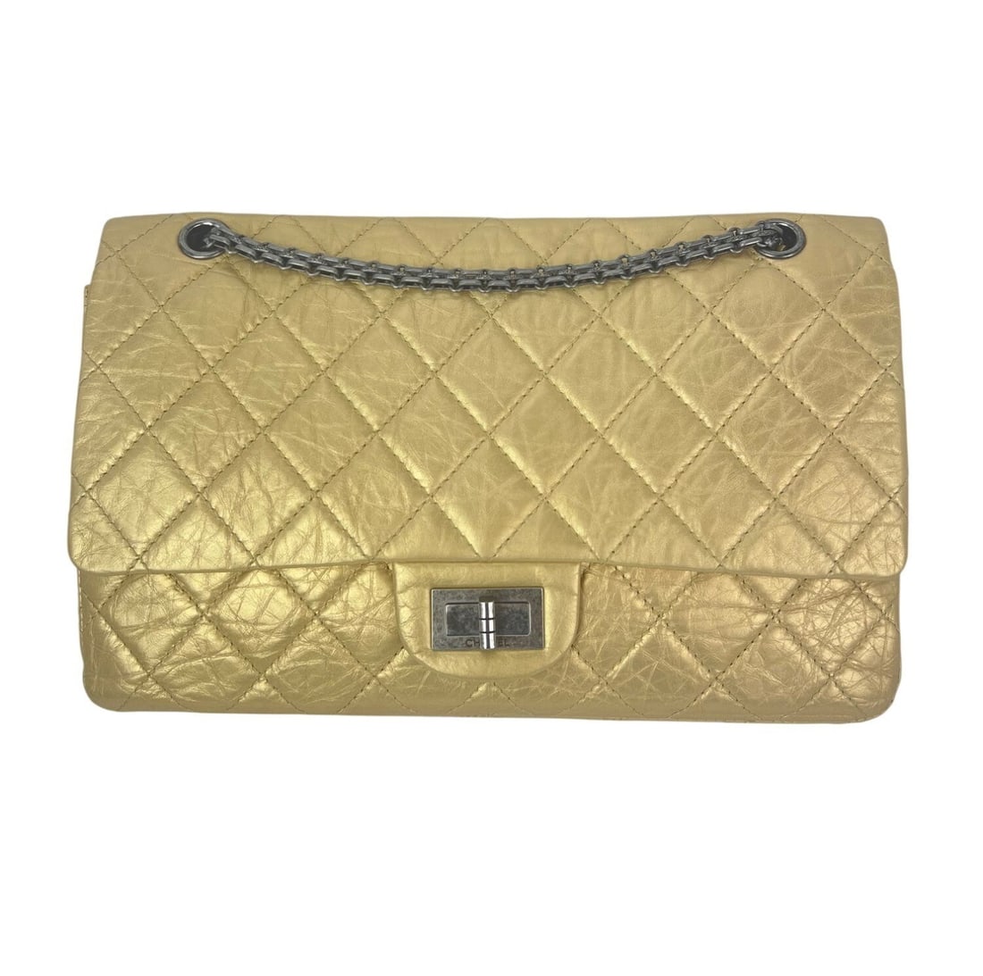 Chanel 227 Double Flap Metallic Calfskin Shoulder Bag: Chanel 227 Double Flap Metallic Calfskin Shoulder Bag This Chanel 2.55 Reissue 227 Double Flap bag features metallic aged calfskin leather in a pale gold tone, complemented by a gunmetal turn lock clo