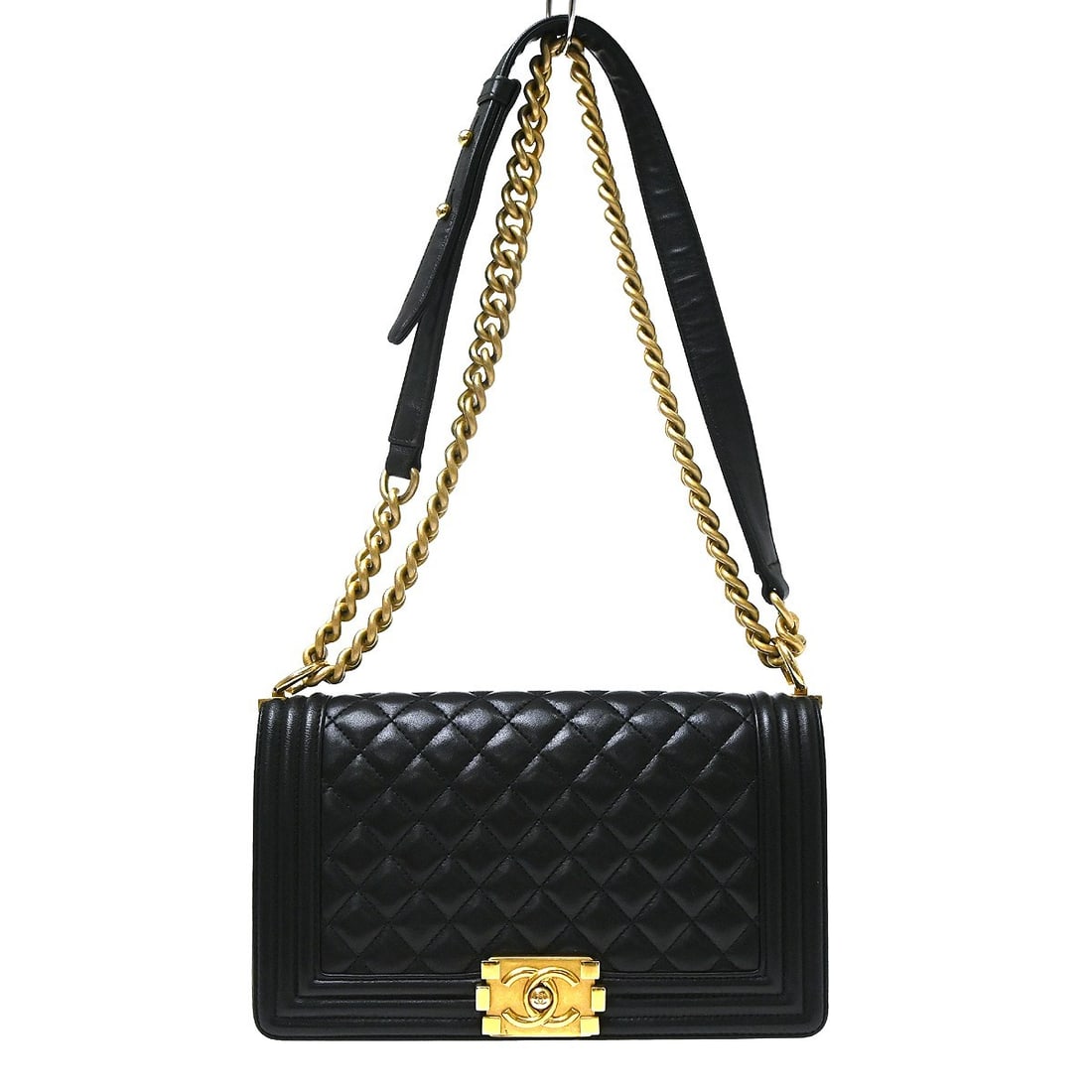CHANEL Boy Medium Black Lambskin Shoulder Bag Silver Tone Lock: CHANEL Boy Medium Black Lambskin Shoulder Bag Silver Tone Lock This CHANEL Boy medium shoulder bag is crafted from black lambskin leather with silver-tone hardware and a quilted lock accent. It featur
