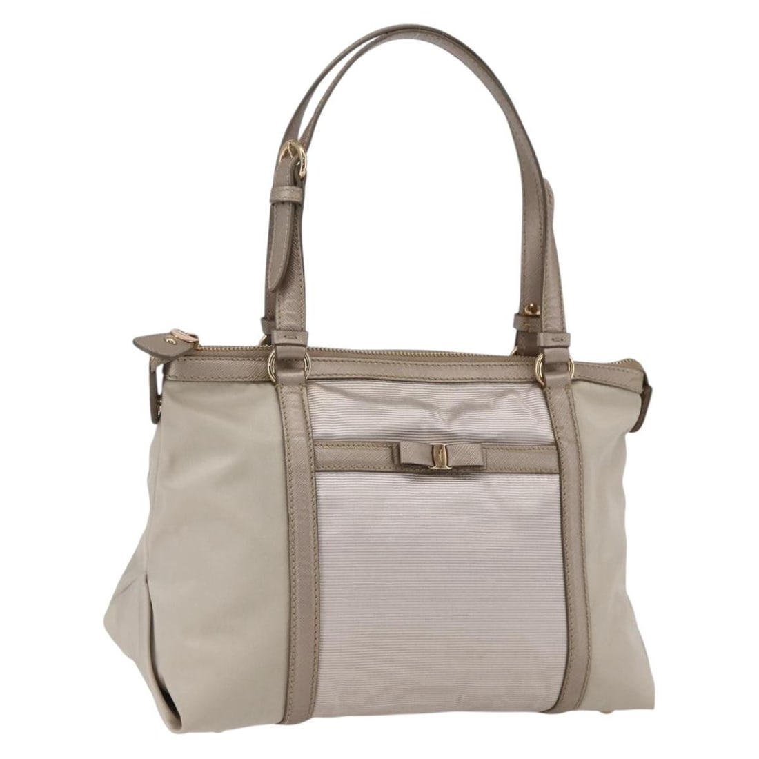 Salvatore Ferragamo Beige Nylon Women's Handbag Gold Accents Italy: Salvatore Ferragamo Beige Nylon Women's Handbag Gold Accents Italy This Salvatore Ferragamo handbag is crafted from durable beige nylon with gold accents, designed for women. Made in Italy, it feature