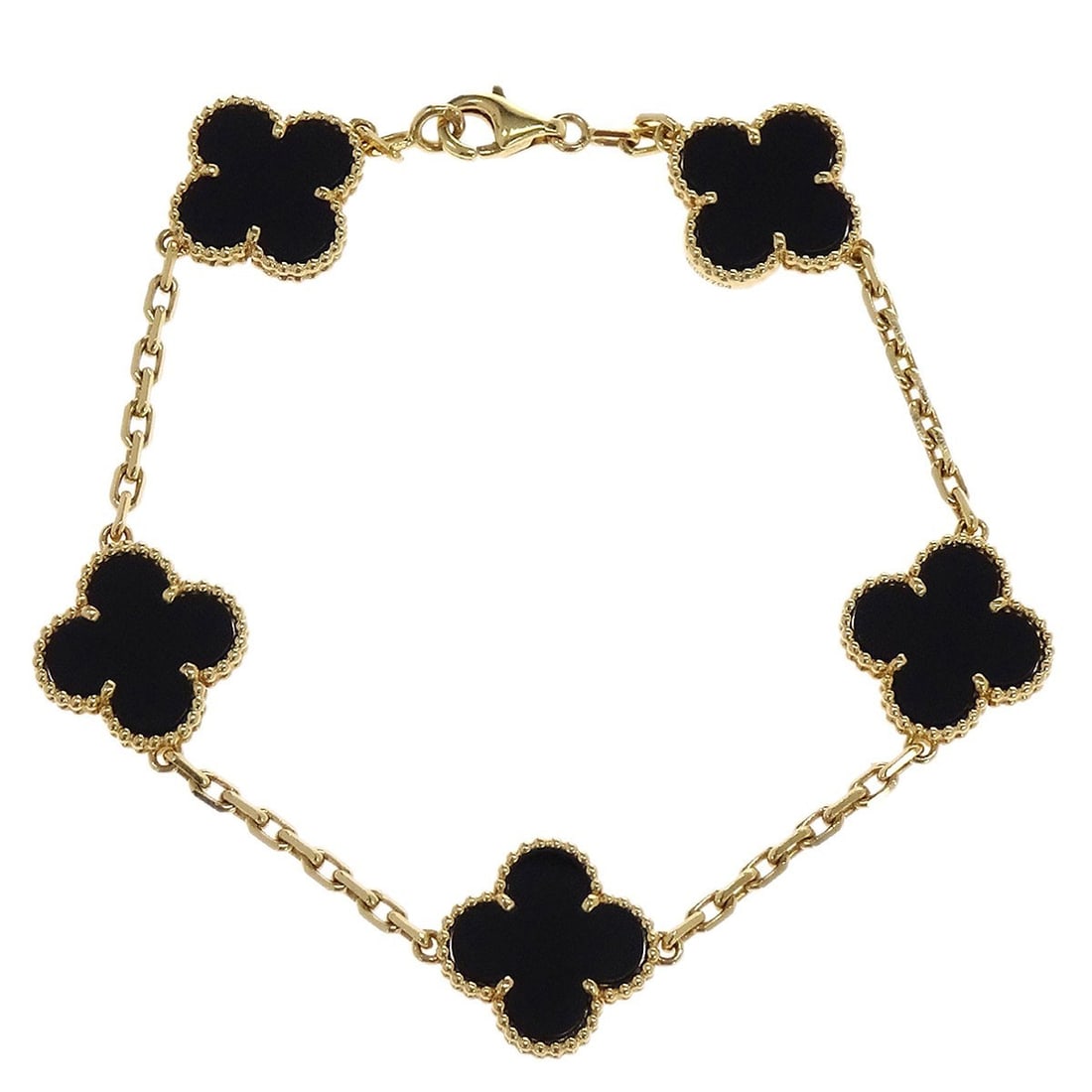 Van Cleef Arpels Alhambra chain bracelet in Au750 with onyx: Van Cleef Arpels Alhambra chain bracelet in Au750 with onyx Van Cleef & Arpels Alhambra bracelet crafted in Au750 gold with onyx accents. This chain-style bracelet features the iconic Alhambra motif i