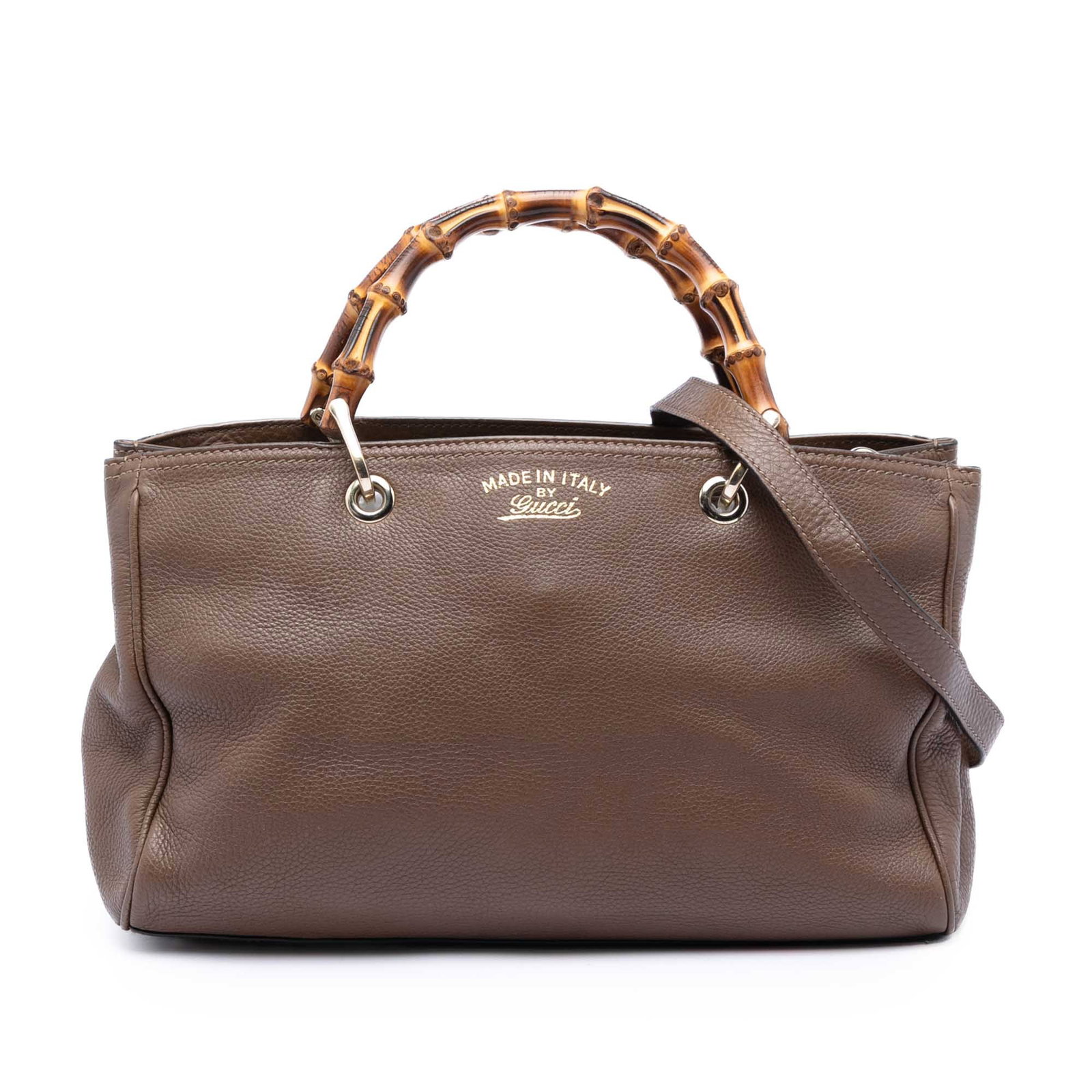 Gucci Bamboo Shopper leather satchel medium brown: Gucci Bamboo Shopper leather satchel medium brown This Gucci Medium Calfskin Bamboo Shopper Satchel is crafted from brown leather and features signature bamboo top handles, a detachable flat leather s
