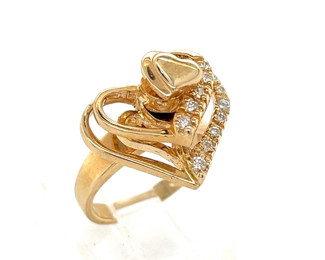 Vintage 14k Yellow Gold Double Heart Spinner Ring with Diamond Accents Size 4: Vintage 14k Yellow Gold Double Heart Spinner Ring with Diamond Accents Size 4 Vintage original spinner ring crafted in 14k yellow gold with a double heart design and diamond accents. The ring is pre-o