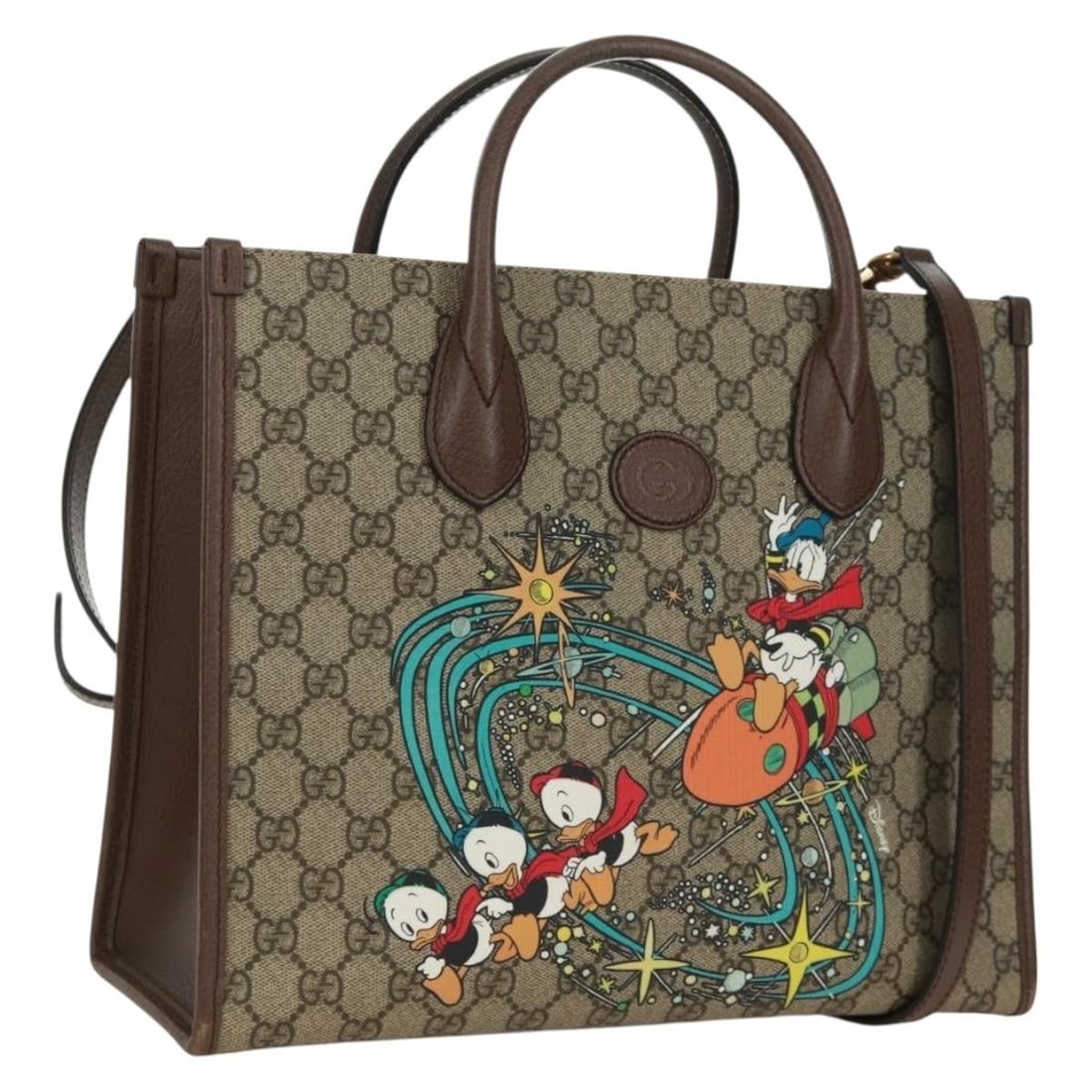 GUCCI 648134 Donald Duck 2way GG Canvas Hand Bag Beige Gold: GUCCI 648134 Donald Duck 2way GG Canvas Hand Bag Beige Gold Gucci hand bag in GG Canvas with a beige and gold exterior. It is a 2-way style and comes with a dust bag and shoulder strap. Made in Italy,