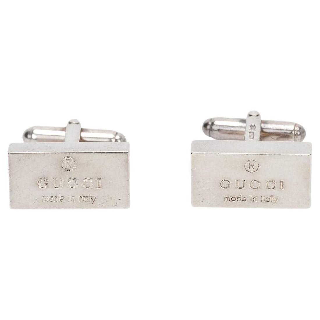 Gucci Sterling Silver Rectangular Logo Cufflinks 2010: Gucci Sterling Silver Rectangular Logo Cufflinks 2010 Elevate your formal wear with these exquisite Gucci rectangular cufflinks, crafted from high-quality sterling silver. These cufflinks feature the 