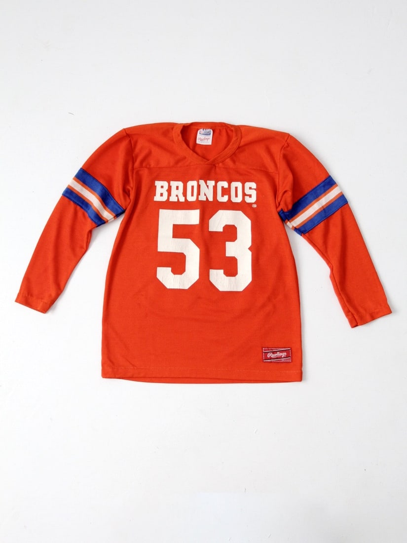 Vintage 1970s Denver Broncos Rawlings Youth Jersey #53 Randy Gradishar: Vintage 1970s Denver Broncos Rawlings Youth Jersey #53 Randy Gradishar This vintage Broncos football jersey from the late 1970s is a true collector's item. Made by Rawlings, this youth jersey showcase