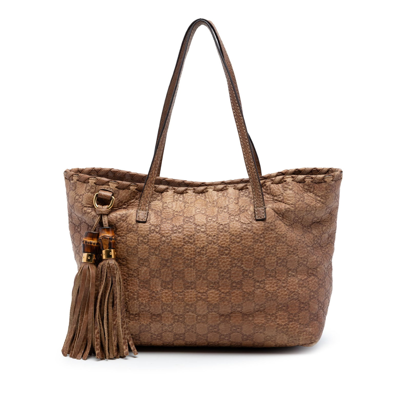 Gucci Medium Leather Bamboo Tassel Tote: Gucci Medium Leather Bamboo Tassel Tote This Gucci Medium Guccissima Bamboo Tassel Tote features a brown embossed leather body with flat leather handles and a distinctive tassel accented by bamboo det