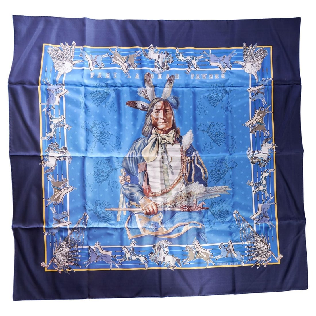 Hermes Pani La Shar Pawnee Silk Limited Edition 90cm Scarf in Box: Hermes Pani La Shar Pawnee Silk Limited Edition 90cm Scarf in Box This limited edition Hermes Pani La Shar Pawnee bandana scarf features a striking black, blue, and celeste silk twill design. Created 