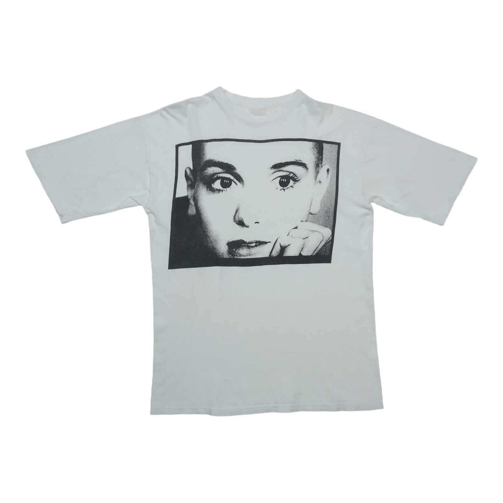 Vintage 1990s Sinead O'Connor White Cotton Shirt Large: Vintage 1990s Sinead O'Connor White Cotton Shirt Large This original vintage 1990s Sinead O'Connor shirt is a genuine piece from the era, not a modern reproduction. Made from 100% cotton, the shirt fe