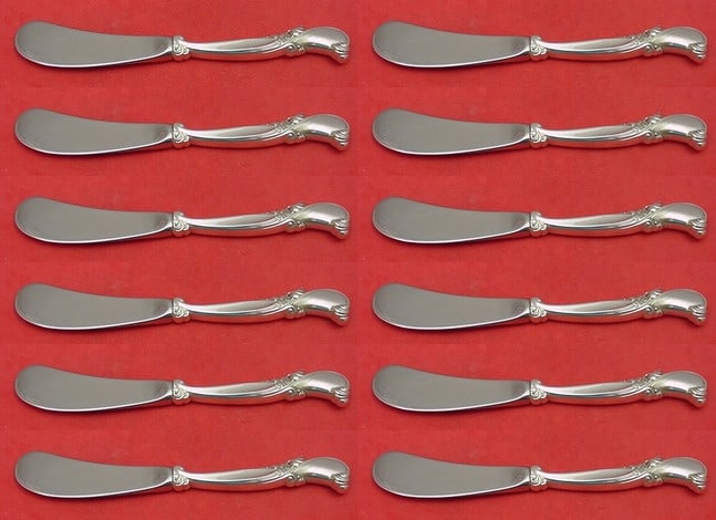Wallace Waltz of Spring 12 Piece Sterling Silver Butter Spreader Set: Wallace Waltz of Spring 12 Piece Sterling Silver Butter Spreader Set Enhance your dining experience with this exquisite 12-piece butter spreader set from Wallace, featuring the elegant "Waltz of Sprin