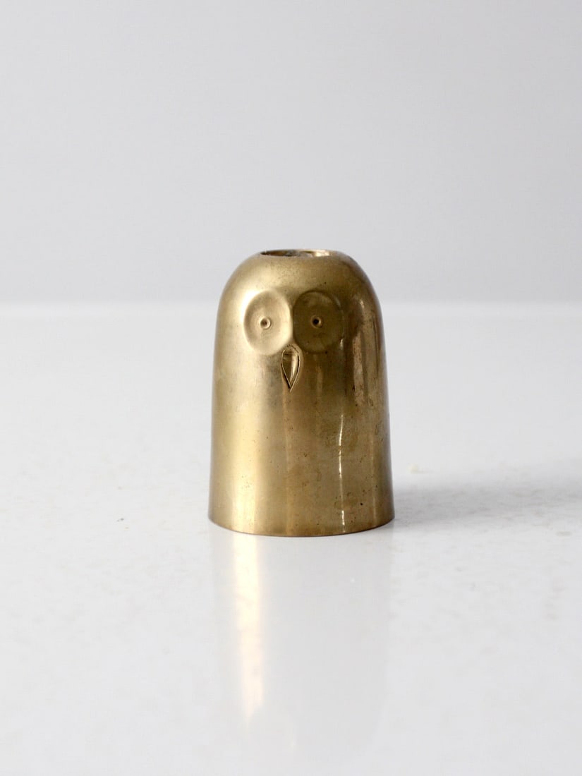 Vintage Brass Owl Candlestick Holder 3 Inch Mid Century Decor: Vintage Brass Owl Candlestick Holder 3 Inch Mid Century Decor This charming mid 20th century brass owl candlestick holder adds a whimsical touch to any decor. Designed to hold a standard candle taper,