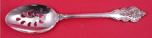 Amston Donatello Pierced Sterling Silver Serving Spoon 8 1/2: Amston Donatello Pierced Sterling Silver Serving Spoon 8 1/2 Sterling silver serving spoon in the Donatello pattern by Amston. This original pierced spoon dates to the 1900-1940 period and is in excel