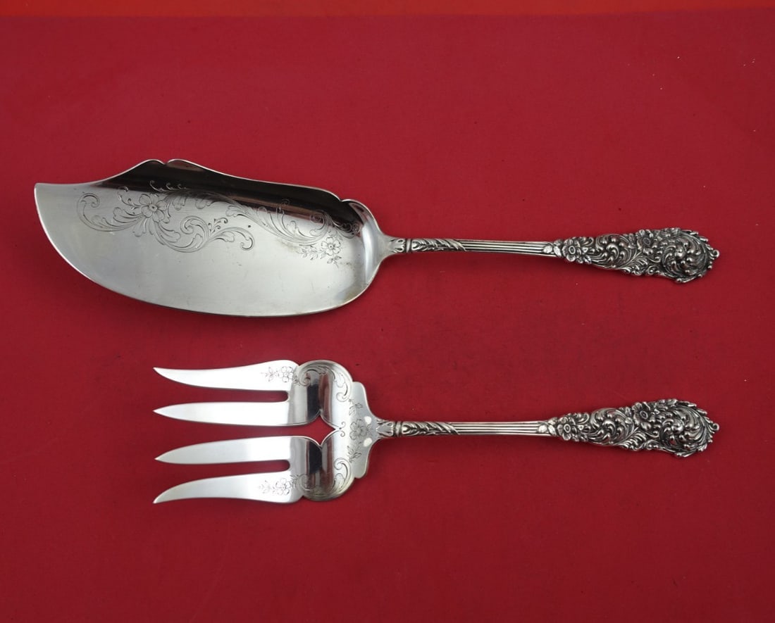 Reed and Barton Trajan Sterling Silver 2pc Fish Serving Set: Reed and Barton Trajan Sterling Silver 2pc Fish Serving Set Elevate your dining experience with this exquisite 2-piece fish serving set from the renowned Trajan pattern by Reed & Barton. Crafted from 