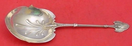 Gorham Lotus Sterling Silver Berry Serving Spoon 9.5 inches: Gorham Lotus Sterling Silver Berry Serving Spoon 9.5 inches This exquisite serving spoon features the elegant Lotus pattern by Gorham, crafted from high-quality sterling silver. The spoon boasts a uni