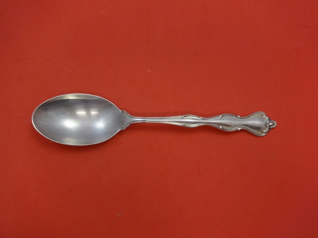 International Mademoiselle Sterling Silver Serving Spoon 8 1/2": International Mademoiselle Sterling Silver Serving Spoon 8 1/2" Sterling silver serving spoon in the Mademoiselle pattern by International. It is not monogrammed and is in excellent pre-owned conditio
