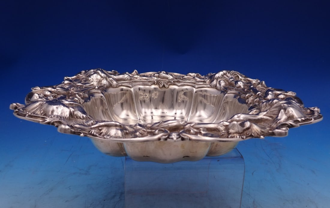 Whiting Sterling Silver Floral Rim Fruit Bowl 1 1/2 x 10 1/2: Whiting Sterling Silver Floral Rim Fruit Bowl 1 1/2 x 10 1/2 This Whiting sterling silver fruit bowl features a wide, ornate floral rim and is crafted in the United States. The bowl is marked, measure