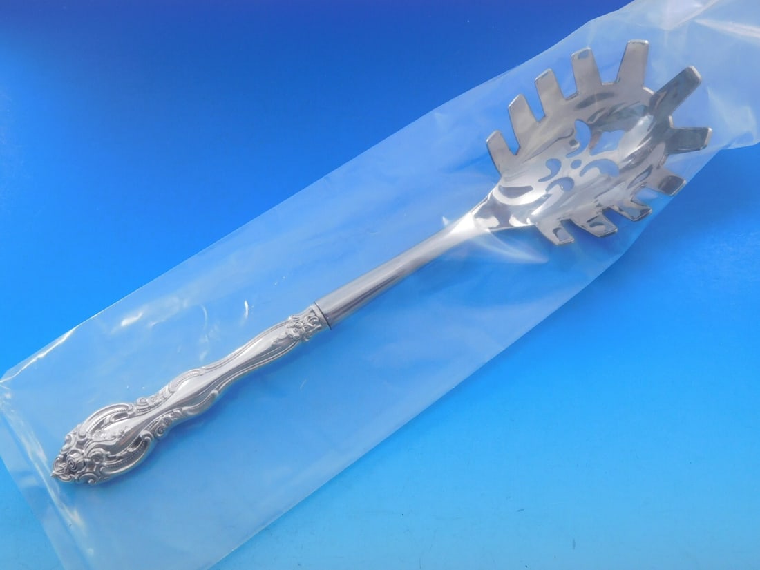 Gorham La Scala Sterling Silver Pasta Server 11 Inch Custom Made: Gorham La Scala Sterling Silver Pasta Server 11 Inch Custom Made Elevate your dining experience with this exquisite La Scala pasta server by Gorham. Crafted from high-quality sterling silver, this cus