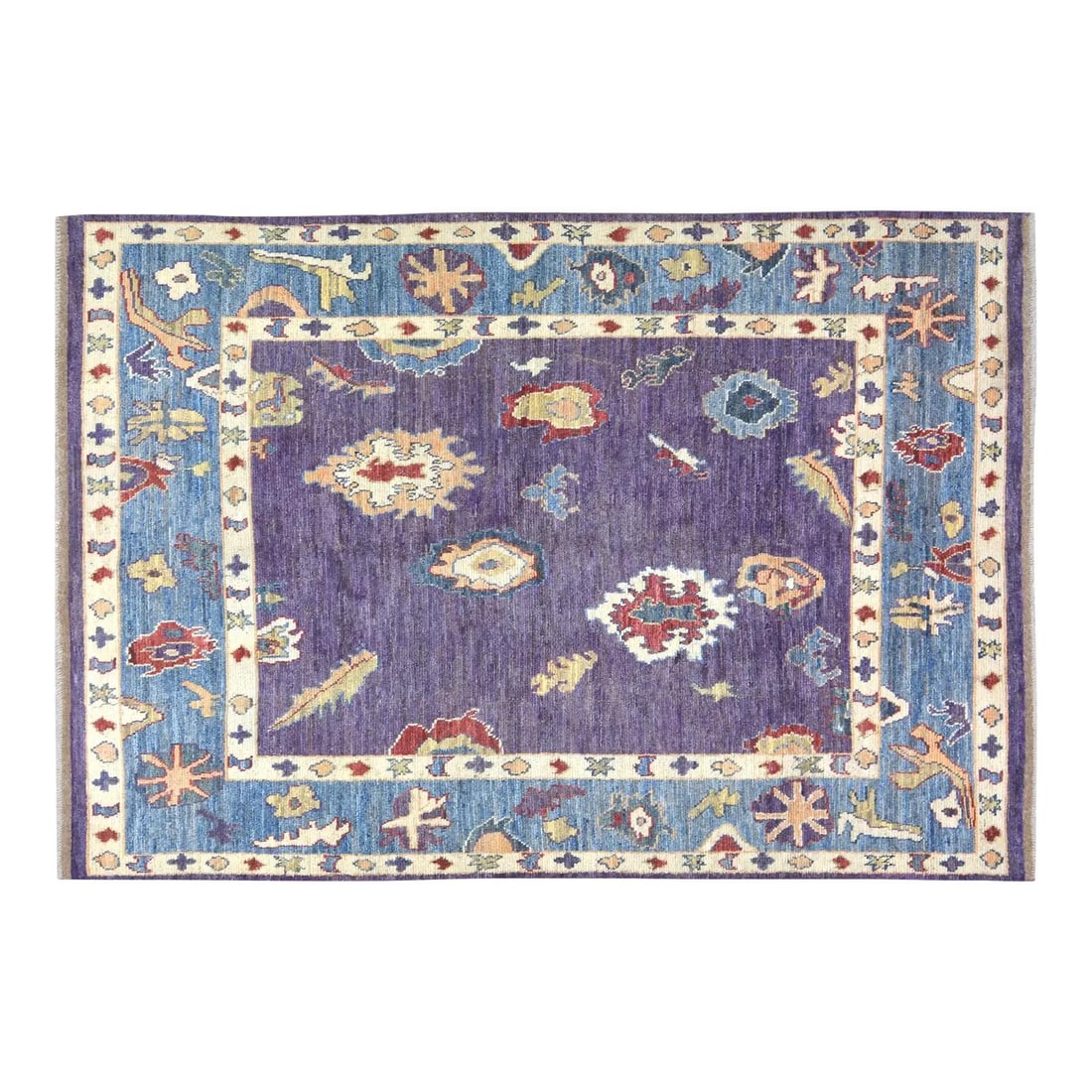 6'2 x 9' Turkish Oushak Hand Knotted Wool Area Rug: 6'2 x 9' Turkish Oushak Hand Knotted Wool Area Rug This transitional Turkish Oushak rug is hand-knotted from fine wool and features natural colors with a purple hue. The rug is pre-owned and crafted w