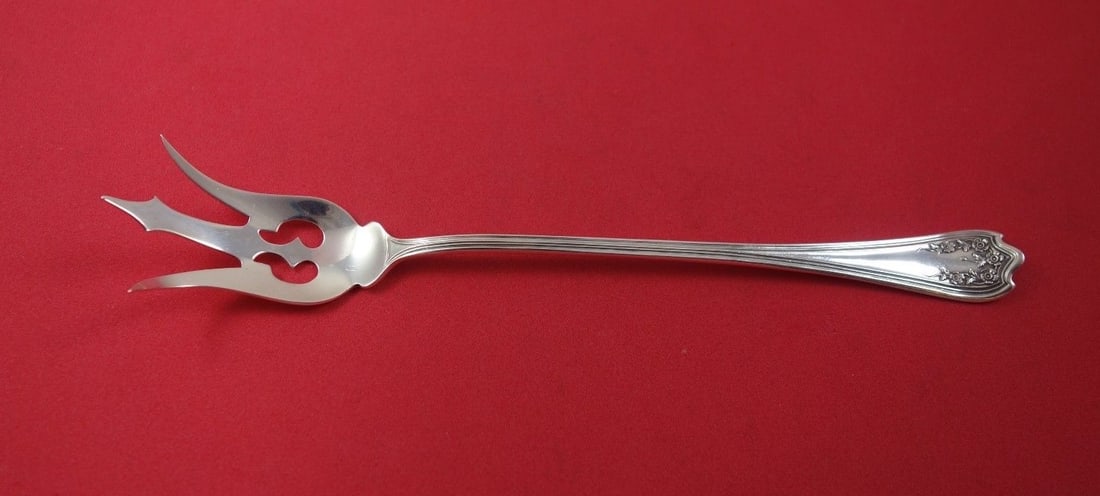 SSMC-Saart Blossom Sterling Silver 8" Lettuce Serving Fork: SSMC-Saart Blossom Sterling Silver 8" Lettuce Serving Fork This exquisite 8" serving fork from the Blossom pattern by SSMC-Saart is crafted from high-quality sterling silver. Manufactured between 1900