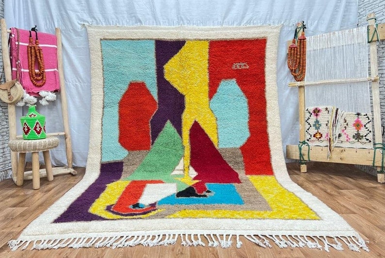 Authentic Handwoven Colorful Berber Rug from Morocco 10 x 6.56 Feet: Authentic Handwoven Colorful Berber Rug from Morocco 10 x 6.56 Feet Discover the beauty of this stunning colorful rug, handwoven in the Atlas Mountains by skilled Berber women weavers. Crafted with tr