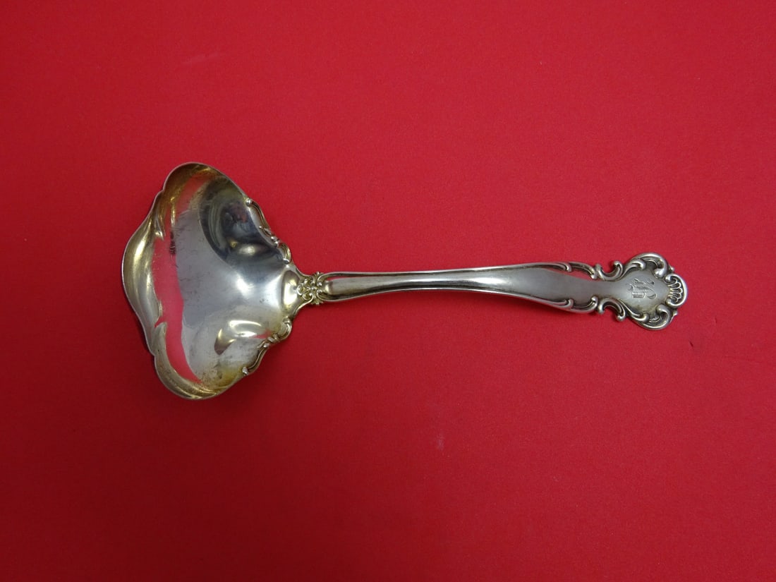 Alvin-Simmons Flanders Old Sterling Silver Gravy Ladle 7.125 inches: Alvin-Simmons Flanders Old Sterling Silver Gravy Ladle 7.125 inches This exquisite gravy ladle features the classic Flanders Old pattern by Alvin-Simmons, crafted from high-quality sterling silver. Wi