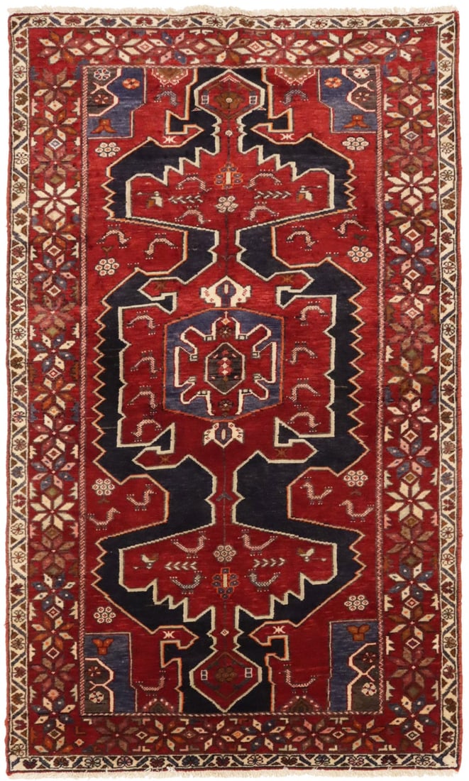 Vintage Hand-Knotted Wool 3'9 x 6'4 Tribal Geometric Rug: Vintage Hand-Knotted Wool 3'9 x 6'4 Tribal Geometric Rug Enhance your home with this stunning vintage area rug, featuring a captivating geometric tribal design that brings warmth and character to any 