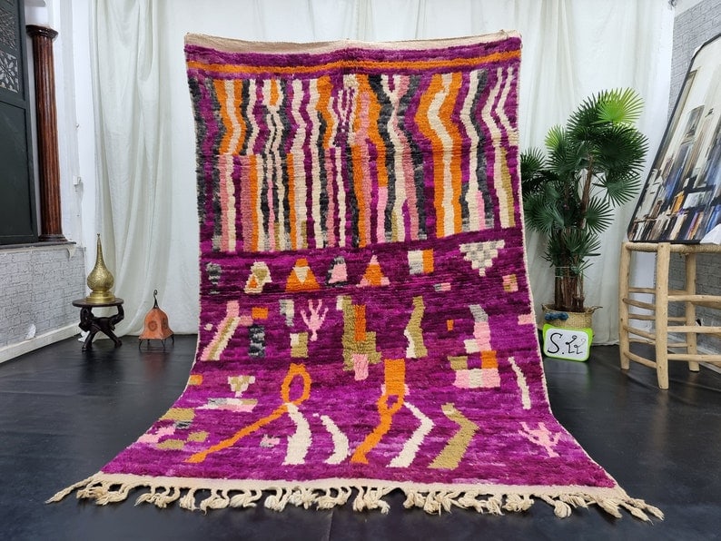 Authentic Pink Handmade Moroccan Berber Wool Rug 10 x 5 Feet: Authentic Pink Handmade Moroccan Berber Wool Rug 10 x 5 Feet Elevate your space with this Luxury Authentic Pink Handmade Moroccan Berber Wool Area Rug. Expertly handwoven by local Berber women in the 