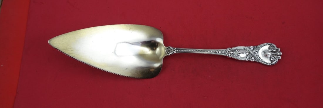 Tiffany & Co. Saint James Sterling Silver Pie Server 10 7/8": Tiffany & Co. Saint James Sterling Silver Pie Server 10 7/8" This exquisite pie server features the renowned Saint James pattern by Tiffany & Co. Crafted from sterling silver, it boasts a flat handle 